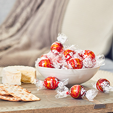 Photograph of Lindt Lindor Truffles on a cheese board, perfect to impress your guests